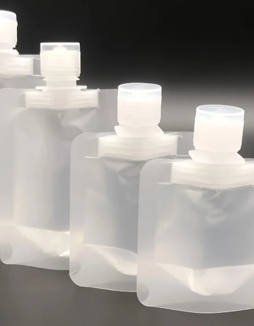 Load image into Gallery viewer, 10Pcs 30/50/100Ml Portable Reusable Plastic Squeeze Packing Bag for Lotion Shampoo Cosmetic Fluids Refillable Travel Pouches