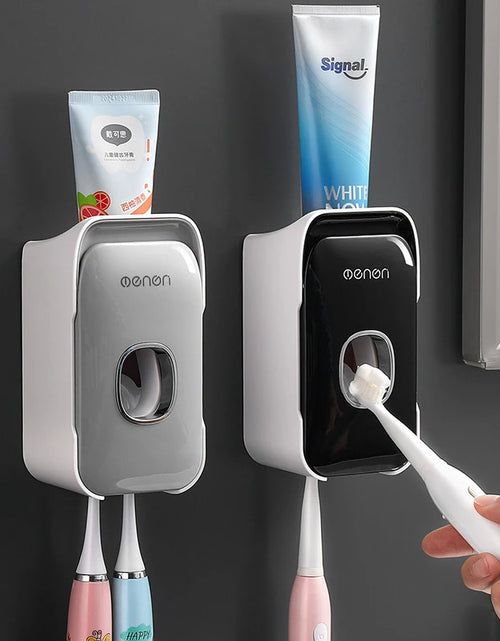 Load image into Gallery viewer, Automatic Toothpaste Dispenser Squeezer with Toothbrush Holder Wall Mounted Bathroom Accessories Sets