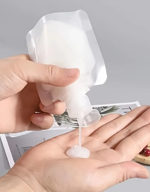 Load image into Gallery viewer, 10Pcs 30/50/100Ml Portable Reusable Plastic Squeeze Packing Bag for Lotion Shampoo Cosmetic Fluids Refillable Travel Pouches